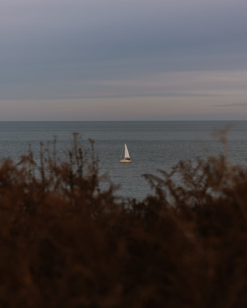 Sail boat out at sea, Jurassic Coast hotels