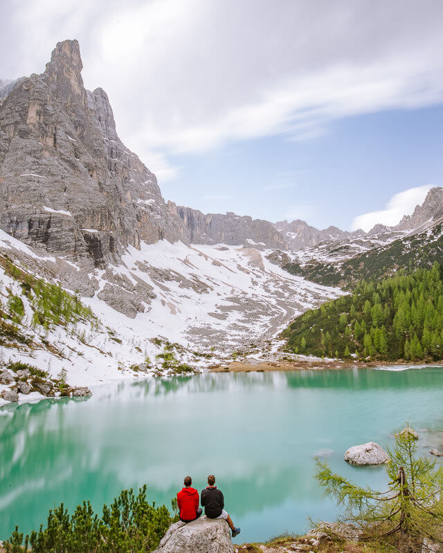 sitting on the banks of Lago di Sorapis