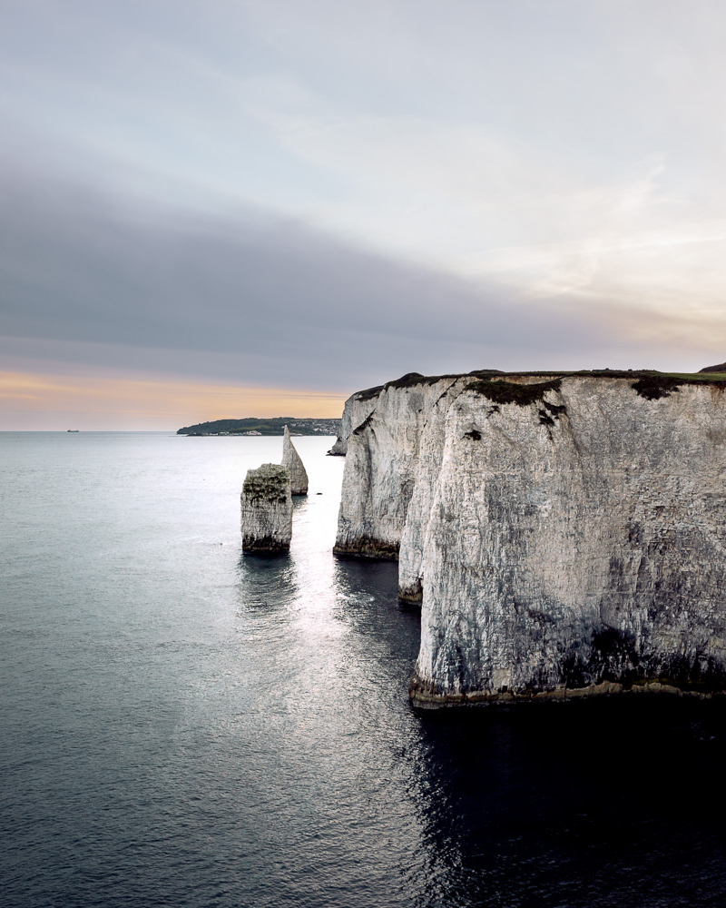 white limestone coastline with 2 white stacks