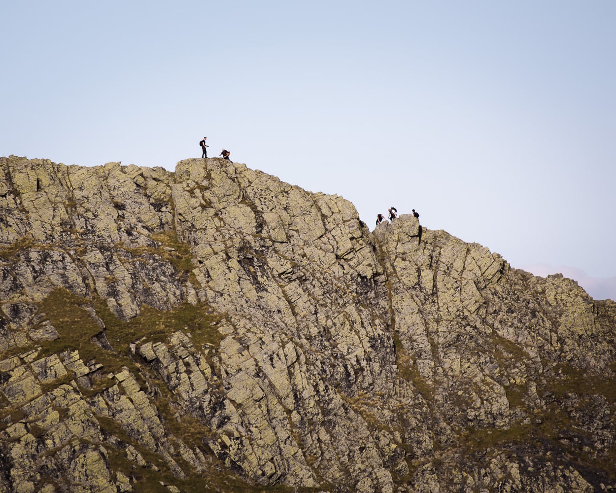 scramblers on a narrow ridge in the Lake District, Sharp Edge