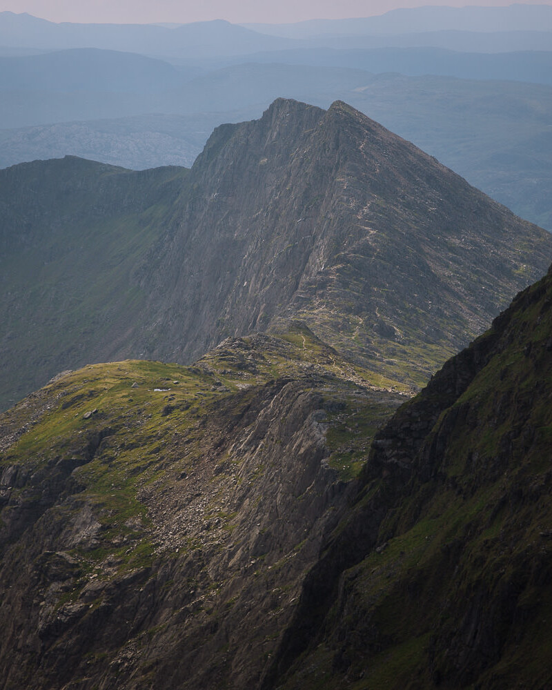 mountain peaks lined with hiking trails