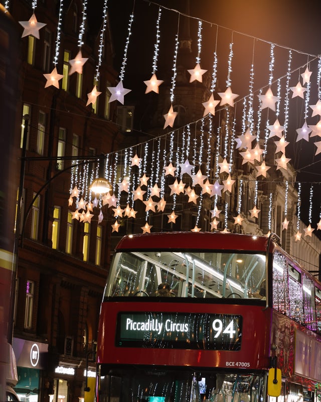 Number 94 London double decker bus under the Oxford Street Christmas lights