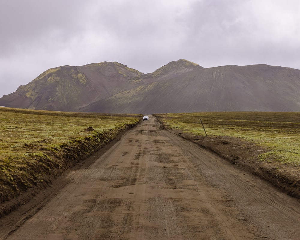 car driving to Landmannalaugar on gravel tracks