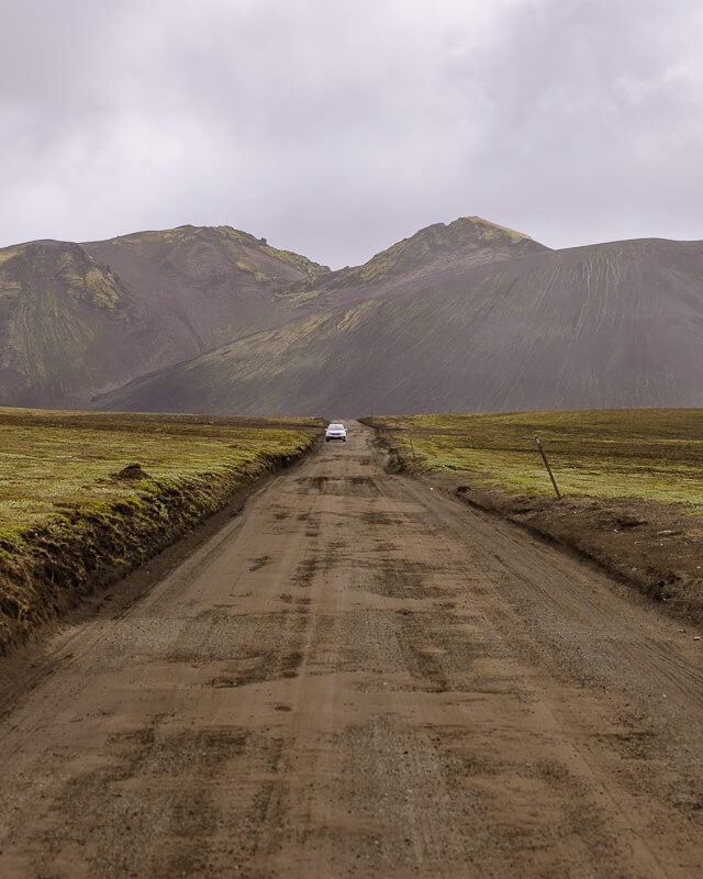 car driving to Landmannalaugar on gravel tracks