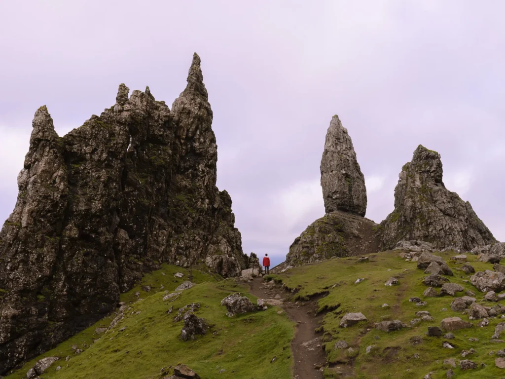Mark standing between the ricky pinnacles of the Old Man of Storr.