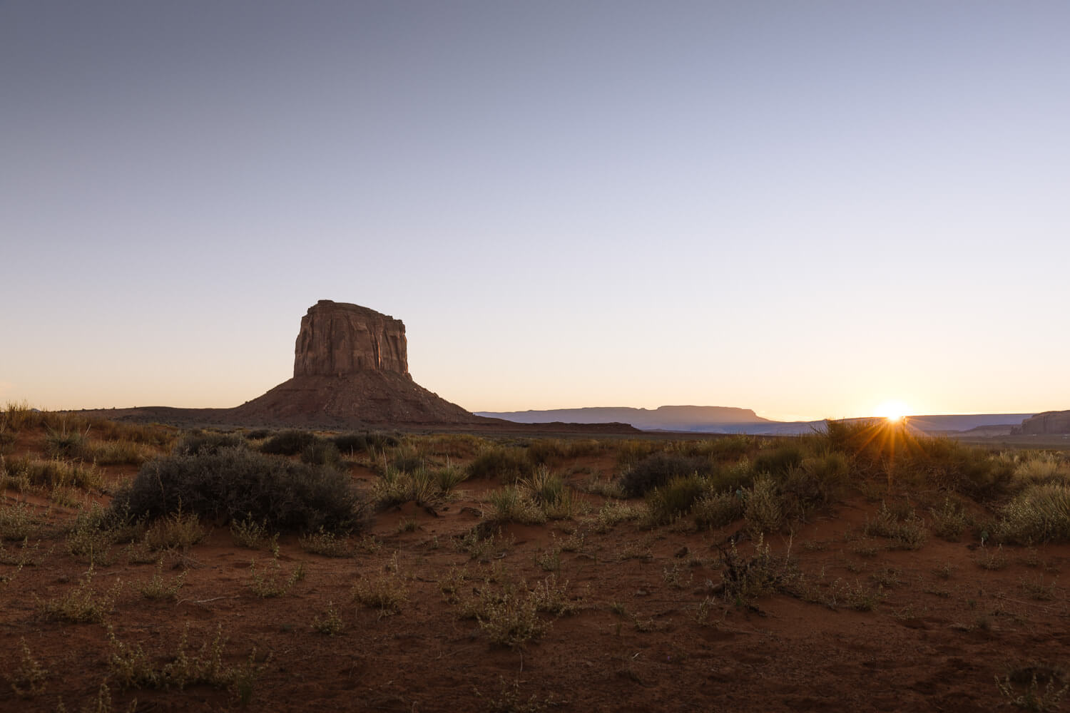 mitchell butte a tmonument valley at dusk