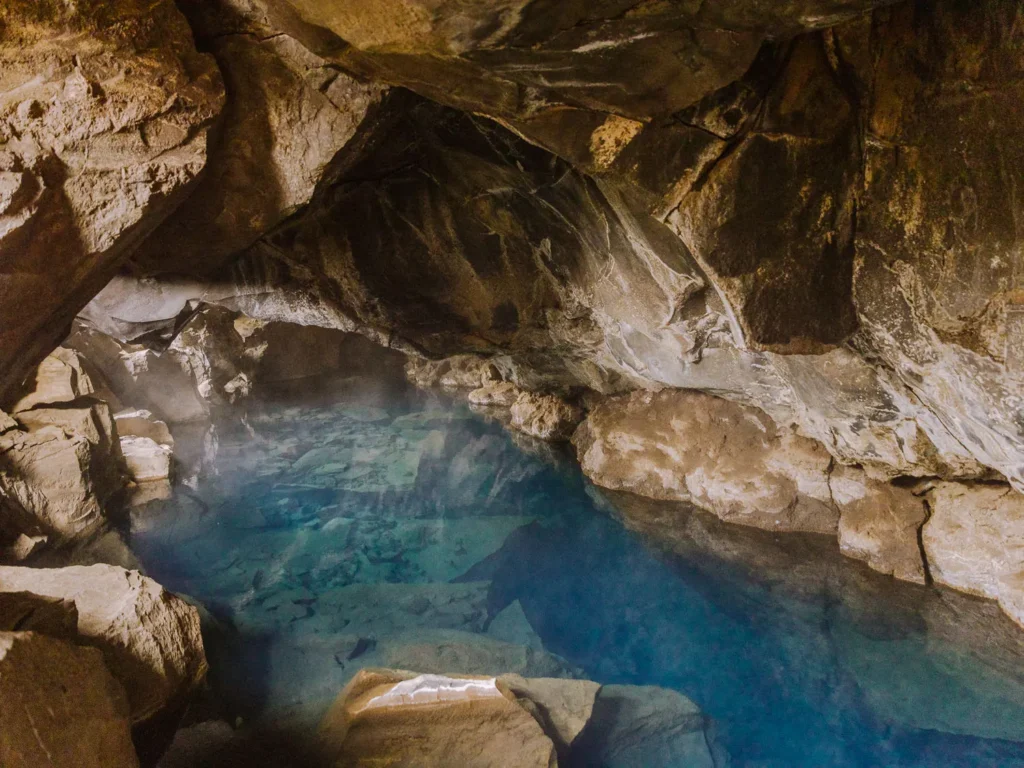 underground cave with bright blue water