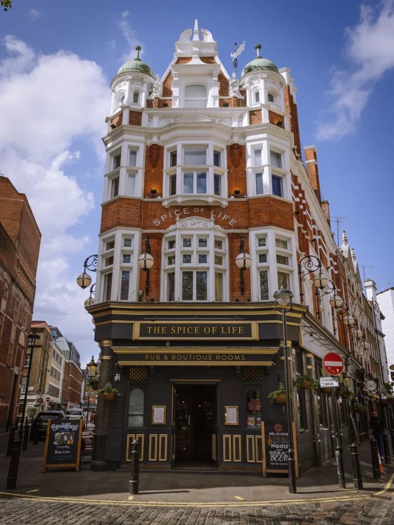 The red brick facade of the Spice of Life Pub and Boutique Rooms in Soho.