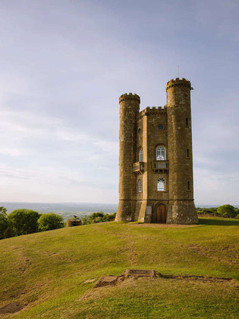 Broadway Tower standing on the Cotswold escarpment with countryside views stretching across the valley.