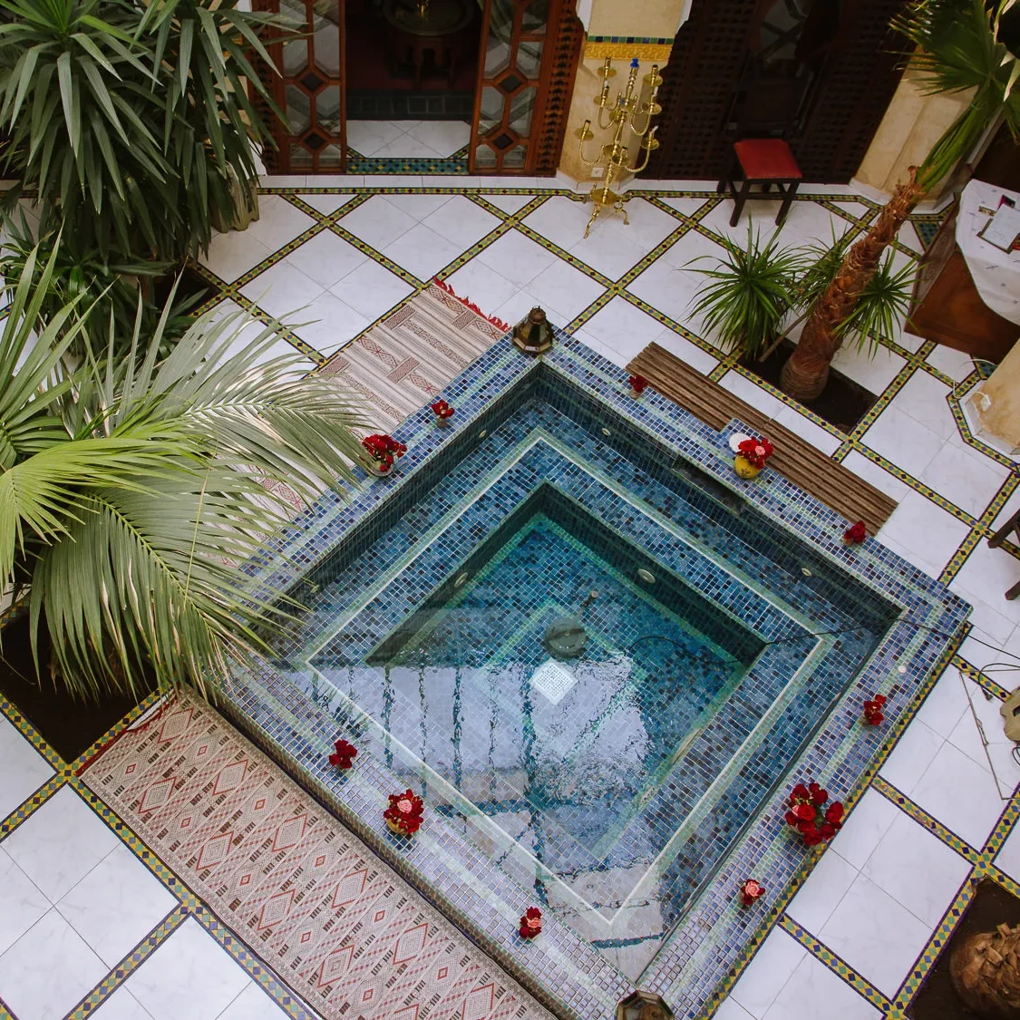 riad in marrakech with a central pond