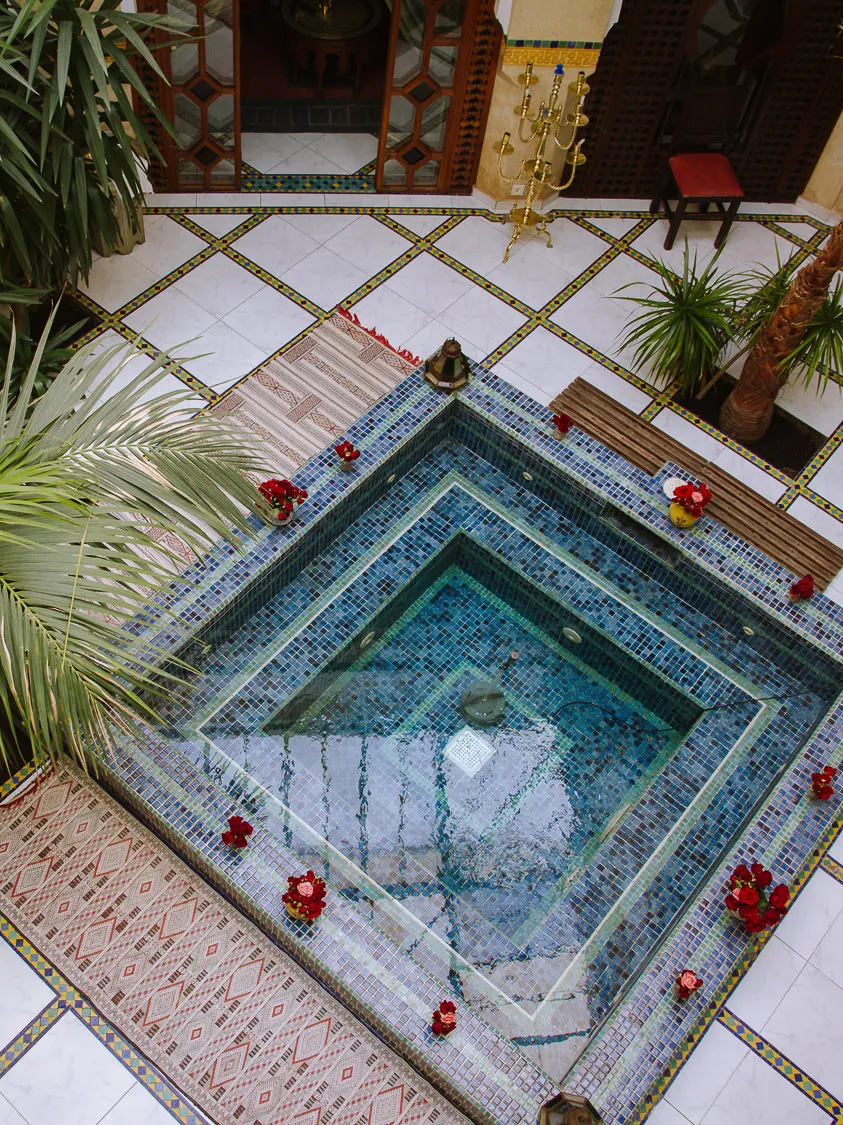 riad in marrakech with a central pond