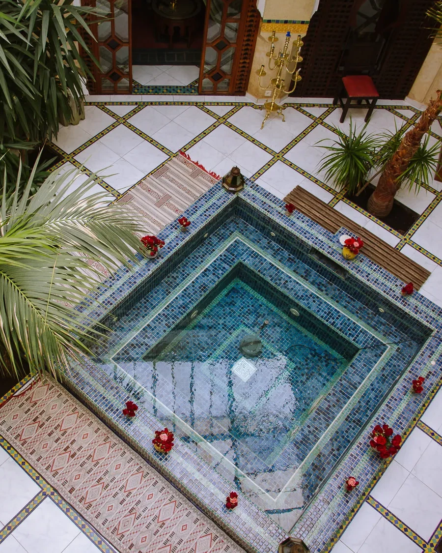 riad in marrakech with a central pond