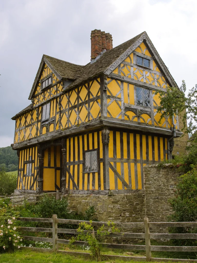 Historic yellow-and-black timber-framed house in the Shropshire countryside near Ludlow