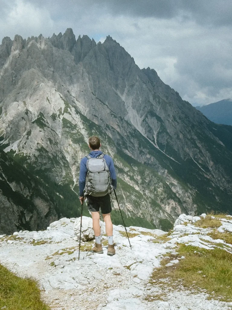 spiky mountains in the distance on the descent of the torre dei scarperi hike