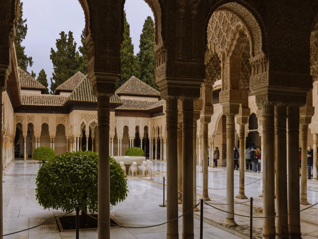 rows of columns at the court of the lions in the nasrid palaces, alhambra