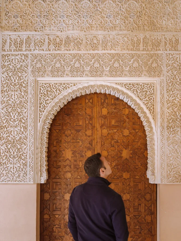 mark standing in front of a door in the nazrid palaces