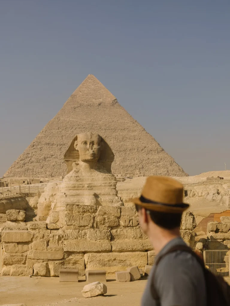 mark standing in front of the sphinx