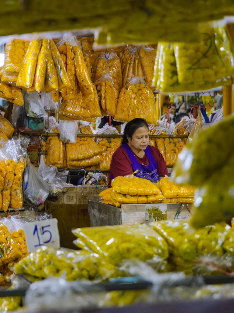 Marigold garland stall at Pak Khlong Talat flower market, Bangkok