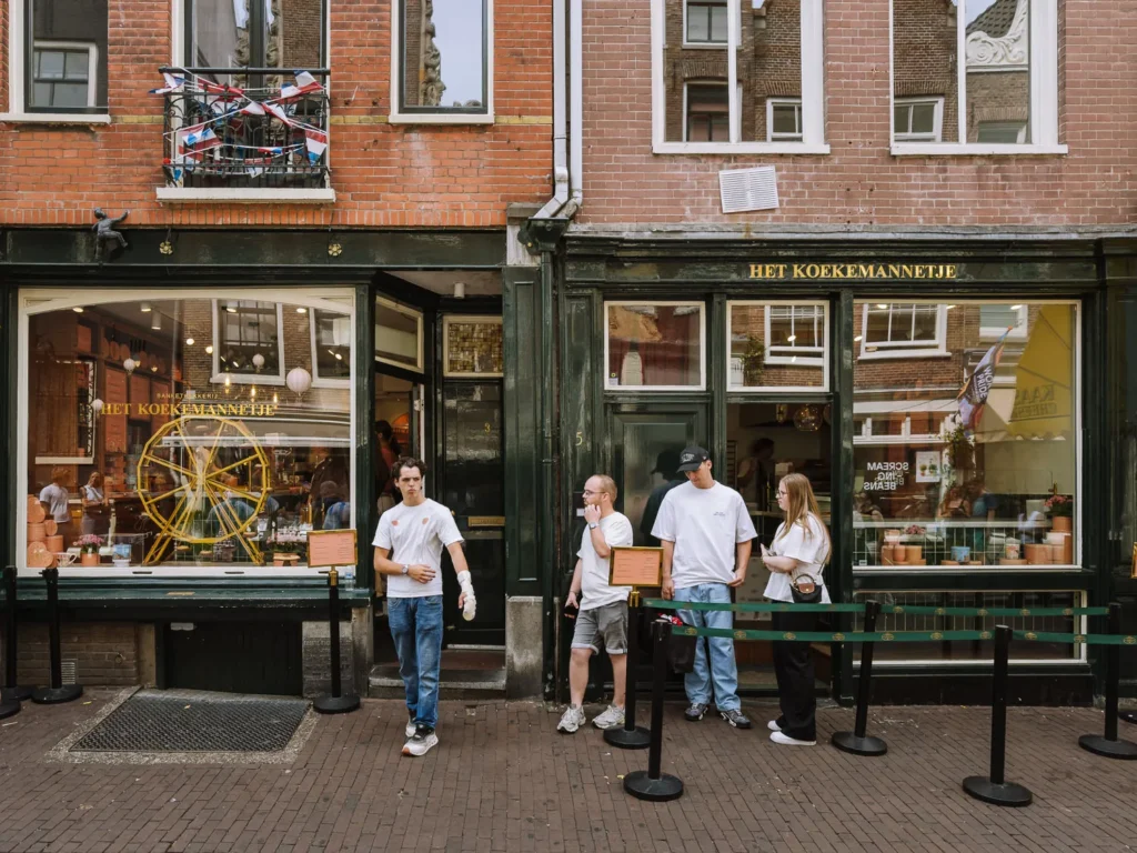 Visitors outside Het Koekemannetje cookie shop on Runstraat in Amsterdam’s Nine Streets district
